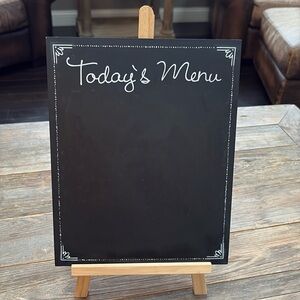 Today’s menu chalk board plaque on wooden stand.